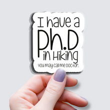 Load image into Gallery viewer, I have a Ph.D in Hiking... - Vinyl Sticker